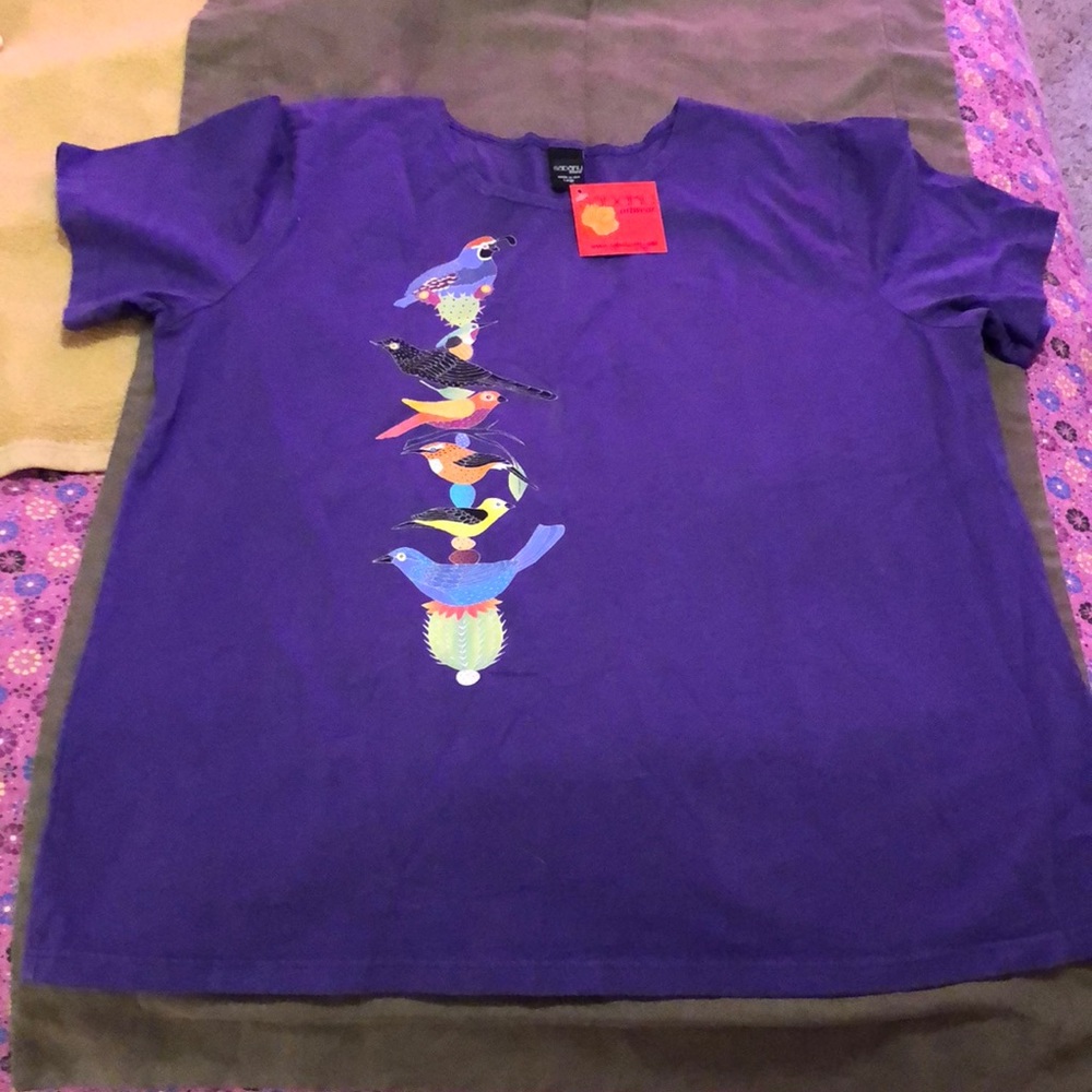 Very cute bird shirt never worn
